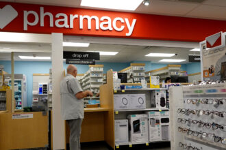 CVS, Walgreens pull back COVID vaccines in more than a dozen states following new guidelines
