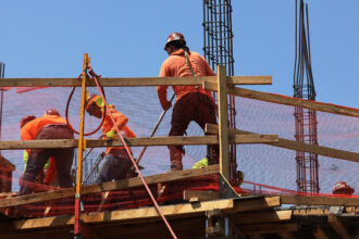 US economy grew at a faster pace in Q2 following Commerce Department revision