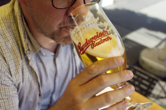 Unlikely partnership between streaming giant and global beer brand may indicate the future of advertising