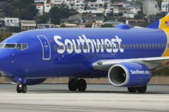 Southwest Airlines begins using FAA-mandated cockpit barriers on new Boeing jetliners