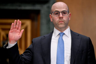 Trump Fed nominee vows independence, unpaid leave from White House if Senate confirms him