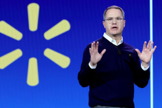 Walmart CEO Doug McMillon says AI will change 'literally every job' in the world as retail evolves