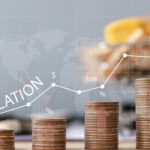 Economic Tension in the UK: Inflation and Job Cuts - An Analysis by FinancialMediaGuide