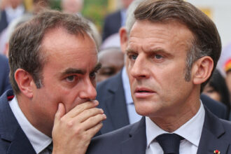 Macron scrambles to restore stability, reappoints ex-PM amid France’s budget crisis