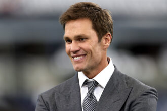 Tom Brady partners with robotic massage company, touts AI tech: 'I want this to be in every locker room'